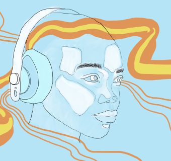 person listening to music with headphones on