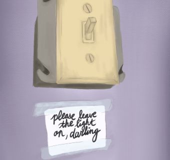 a yellow lightswitch on a purple wall