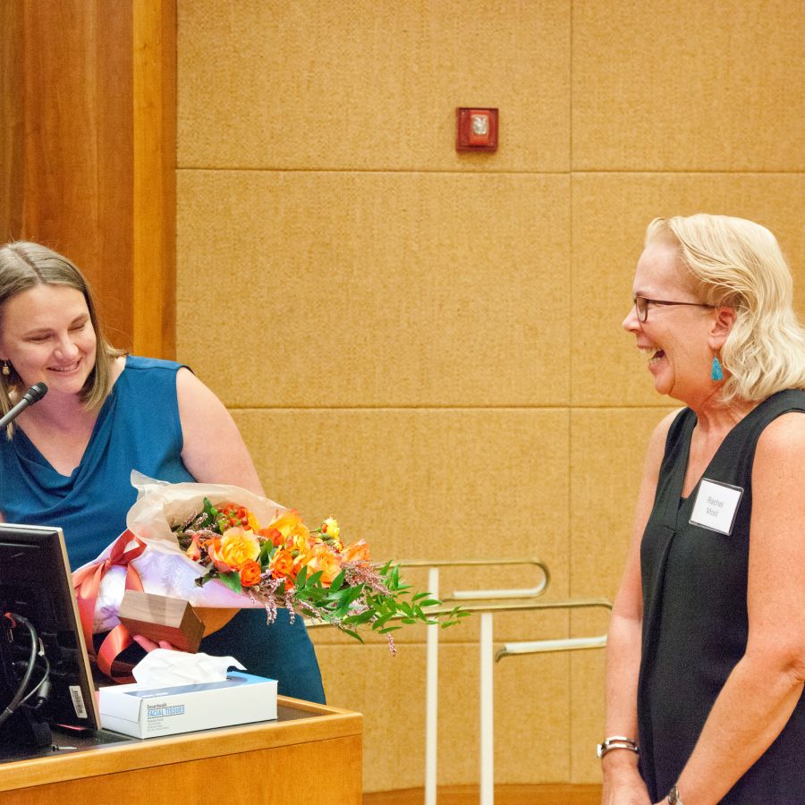 Abby Palko handling Rachel Most flowers at the Elizabeth Zintl Leadership Award Ceremony