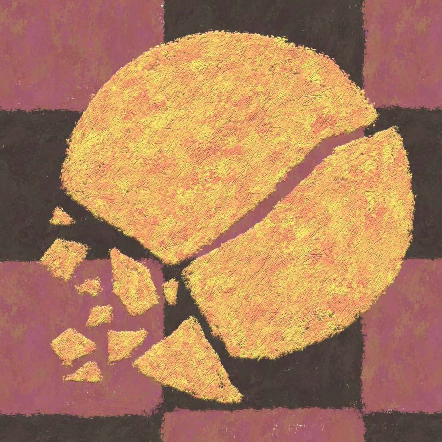 a broken plate on a checkered floor