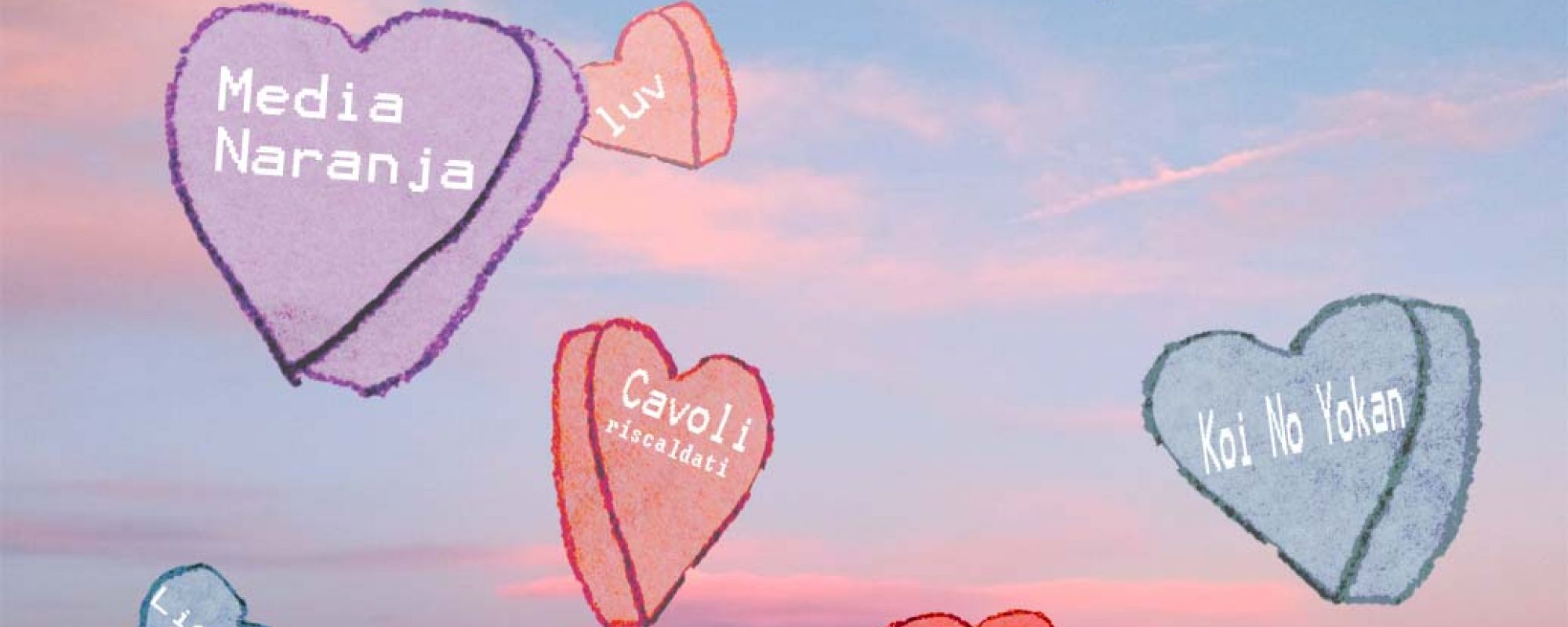 Candy message hearts in a pink sky