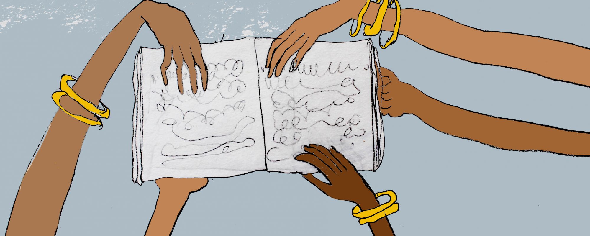 Brown women's hands holding a book