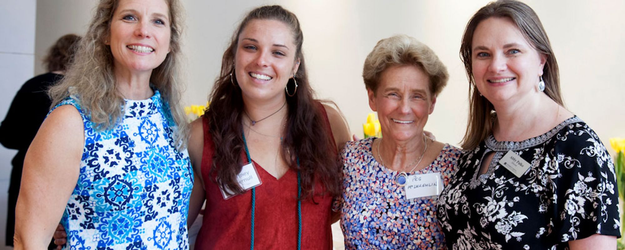 Courtney Cuppernull with her mother, grandmother, and Women's Center Director Abby Palko