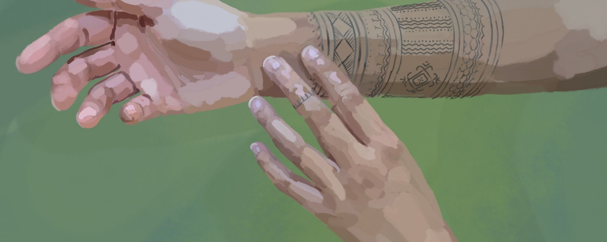 two hands are shown with tattoos with a green background