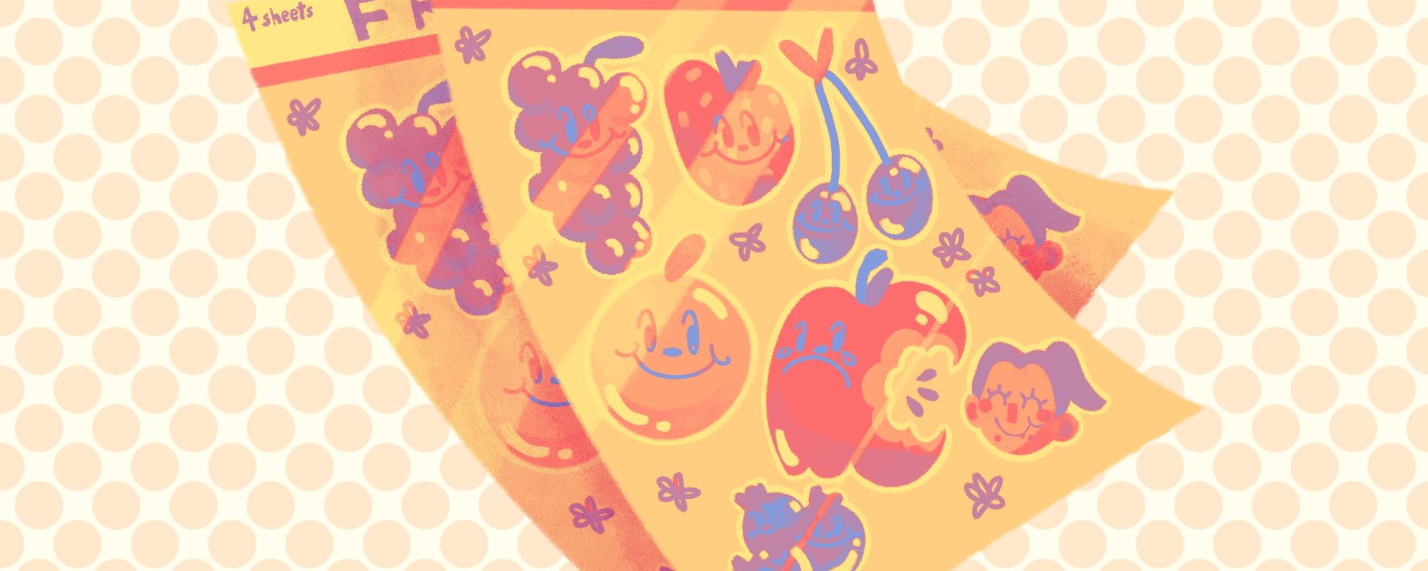 two sheets of colorful fruit stickers on an orange and white background